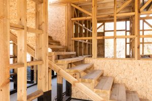 Salvaged building materials like beams, stairs, and framing supplies can save lots of money on home construction.