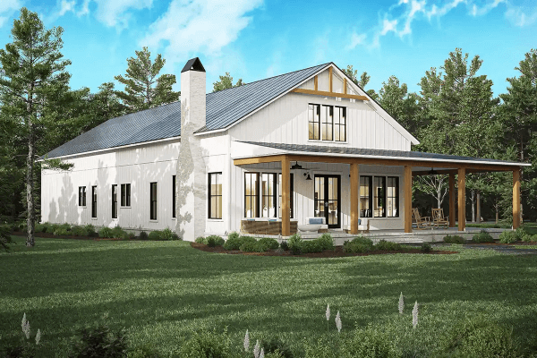 Modern barndominium with a spacious outdoor area.