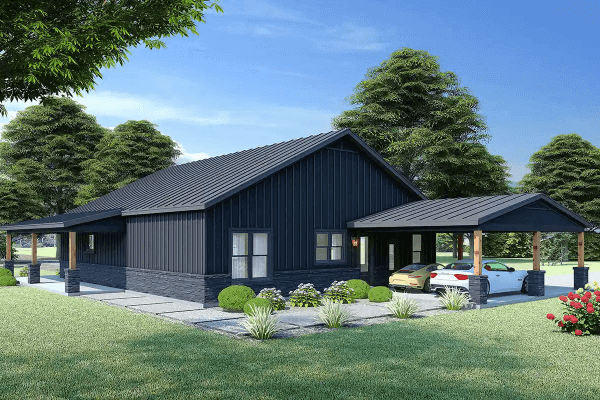 Stylish black barndominium with carport and landscaped garden